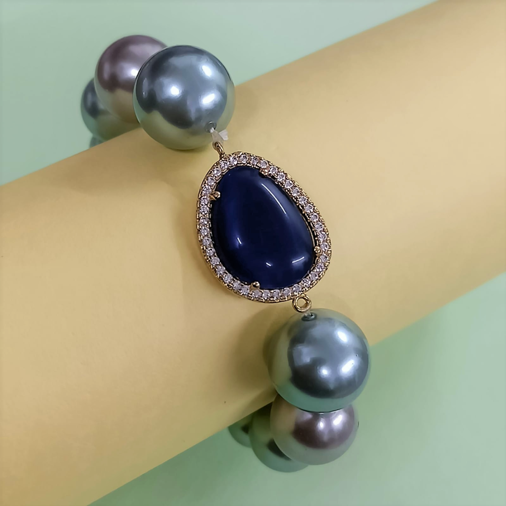 Bdiva Shell Pearl Bracelet with Blue Sapphire Stone.