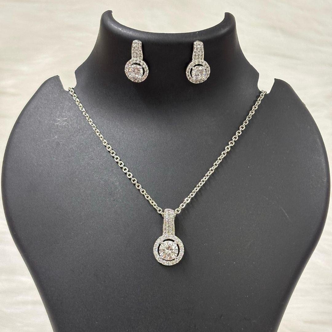 Rhodium Plated Halo Cubic Zirconia Pendant & Stud Earrings Set