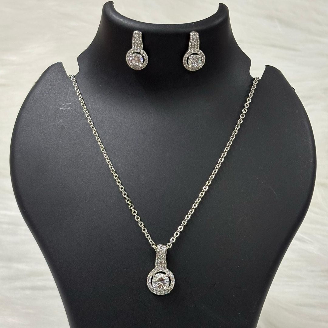 Rhodium Plated Halo Cubic Zirconia Pendant & Stud Earrings Set