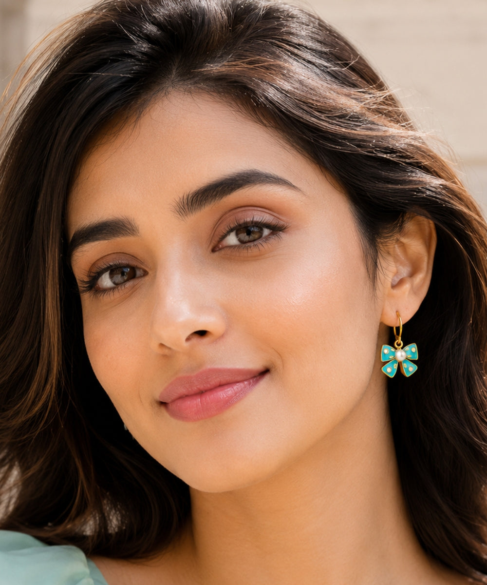 Gold Plated Light Blue Bow Pearl Drop Earrings