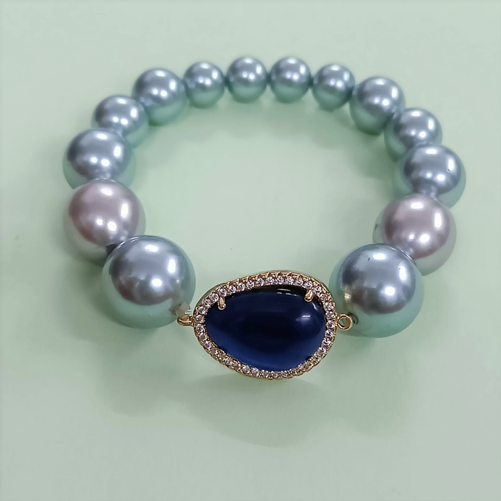 Bdiva Shell Pearl Bracelet with Blue Sapphire Stone.